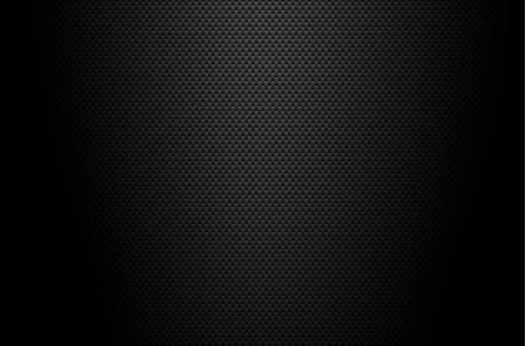 Dark textured background with subtle light gradient.